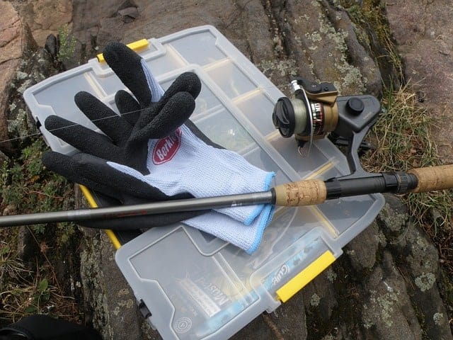 You need all the best gear when you are fishing at Lake Wellington in Gippsland. There are some gloves, a fishing tackle box and a fishing rod in this picture.